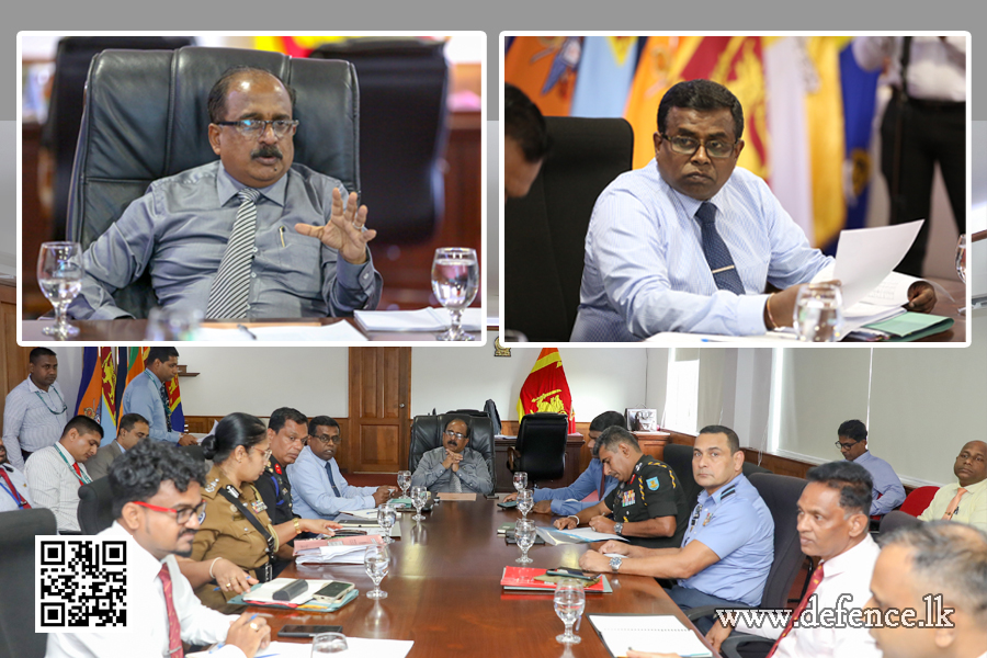 An airman sanitizes indoor shooting stations.