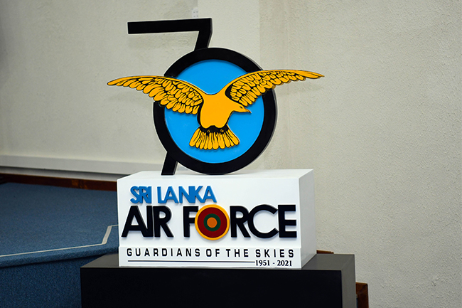 An airman sanitizes indoor shooting stations.