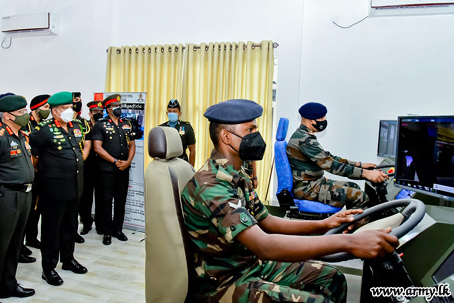 An airman sanitizes indoor shooting stations.