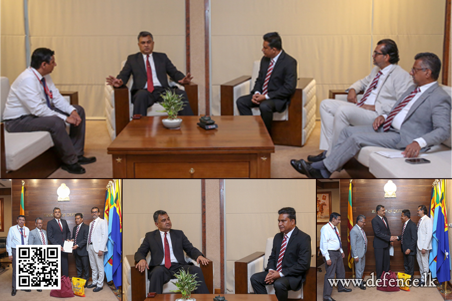 An airman sanitizes indoor shooting stations.