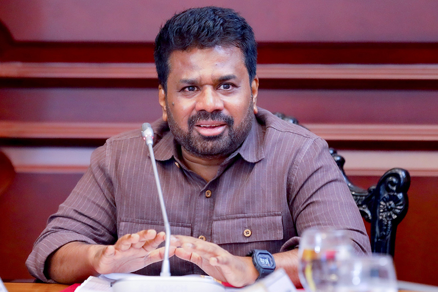 An airman sanitizes indoor shooting stations.