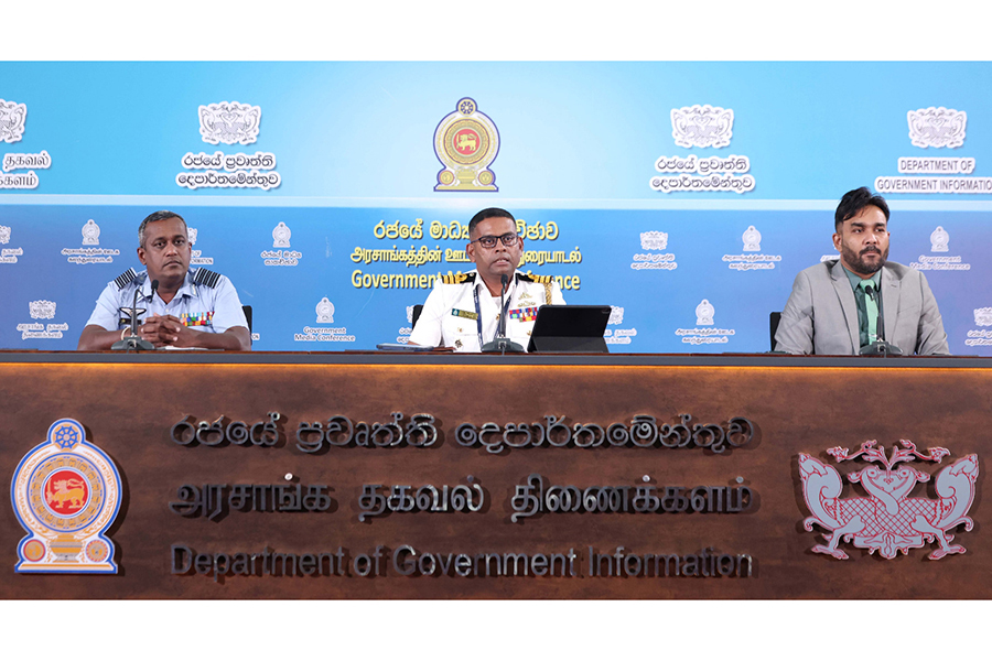 An airman sanitizes indoor shooting stations.