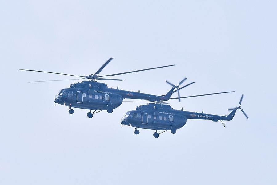 An airman sanitizes indoor shooting stations.