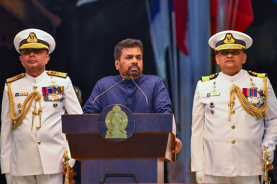 An airman sanitizes indoor shooting stations.
