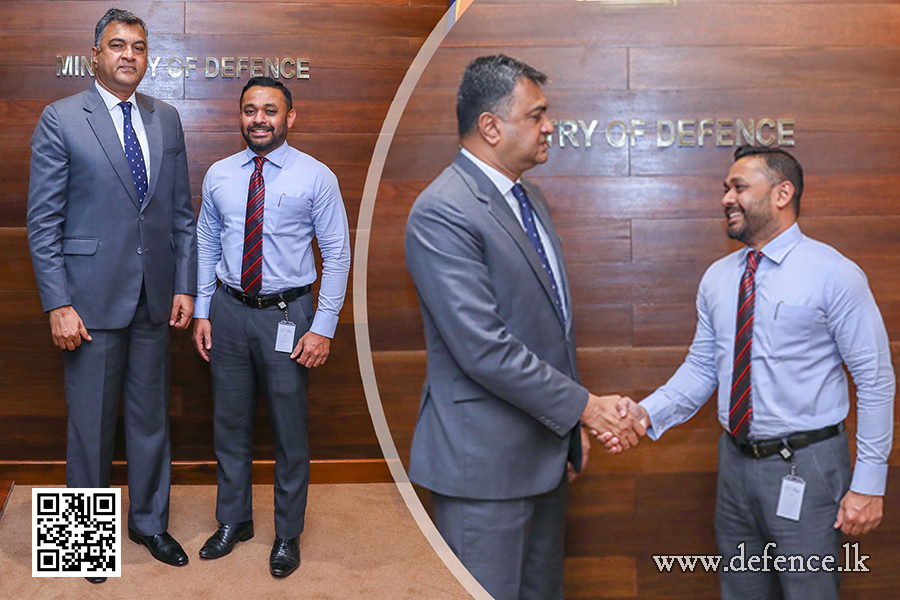 An airman sanitizes indoor shooting stations.